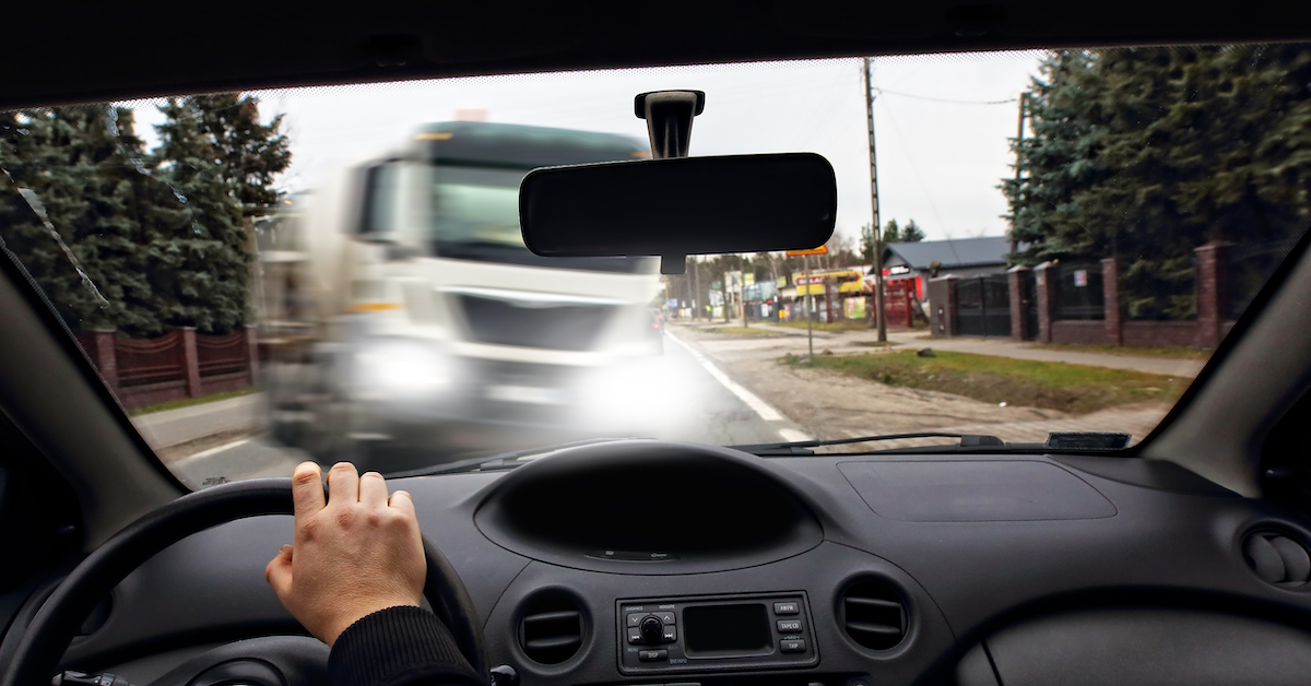 drivers perspective of an oncoming semi truck | Oliver Law Firm