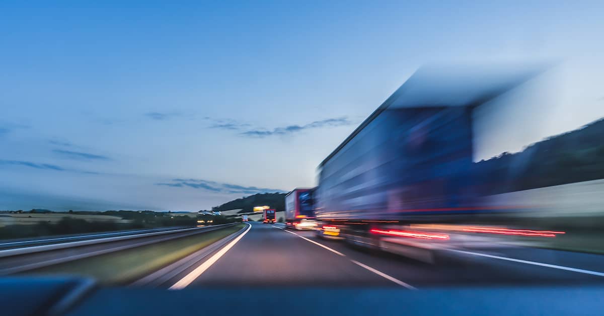 trucks driving on highway | Oliver Law Firm