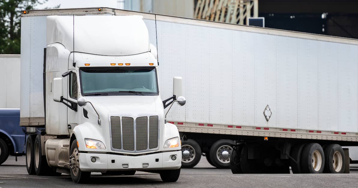 a semi truck makes a 90 degree turn | Oliver Law Firm